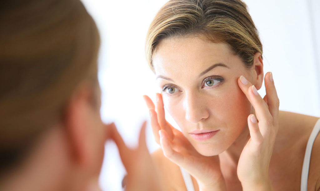 Bagni di sole, macchie cutanee e photoaging